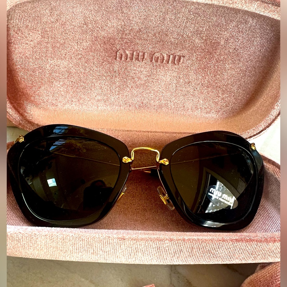 Miu Miu Sunglasses. Brand new, never been worn and still in the box.